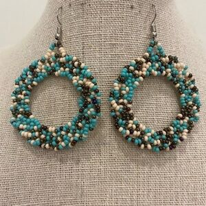 Handmade chakira bead earrings. Handmade by artisans in Mexico 1.5" diameter